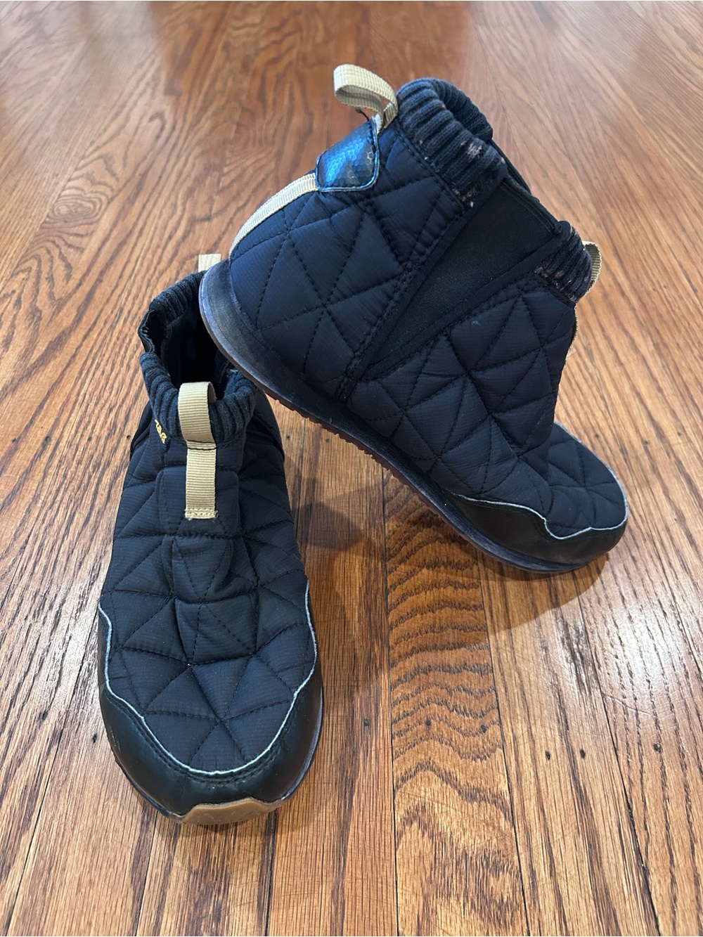 Teva Quilted Black Slip-On Winter Shoes with Tan Pull Tab